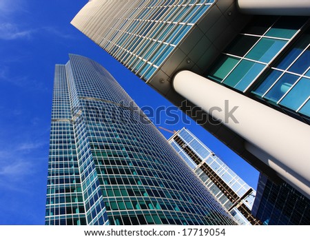 Modern skyscrapers on a bright blue sky background