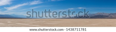 Similar – Image, Stock Photo Sunset sky over wavy sea with floating boats