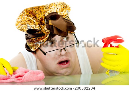 crazy cleaner with a scarf on her head, yellow rubber gloves on his hands and pink dust cloth shows his fear because he spent the entire bottle of detergent for cleaning glass/crazy cleaner