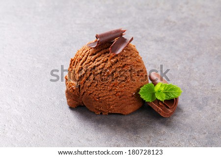 Single ice cream scoop decorated finest chocolate curl
