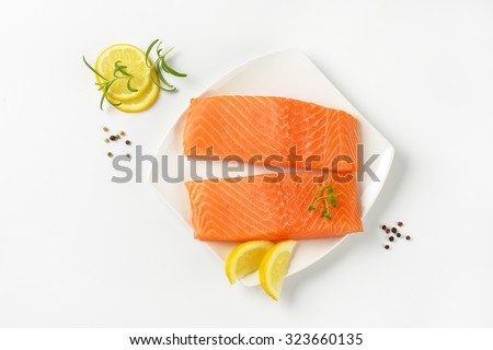 Similar – Image, Stock Photo Raw fish with lemon and herbs