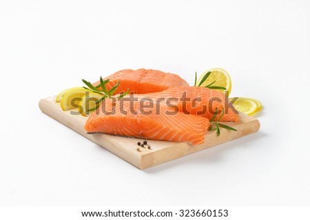 Similar – Image, Stock Photo Raw fish with lemon and herbs