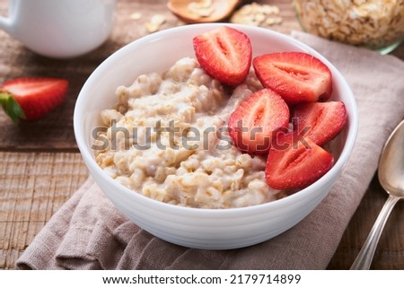 Similar – Image, Stock Photo Porridge with strawberries