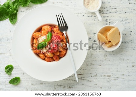 Similar – Foto Bild Gnocchi mit Tomatensauce und Parmigiano auf einem Teller.