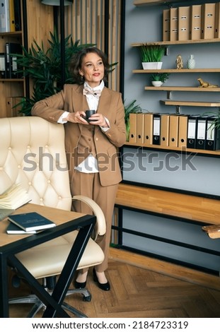 Similar – Image, Stock Photo Stylish mature businesswoman in elegant outfit