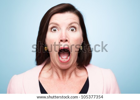 mature woman pulling funny faces