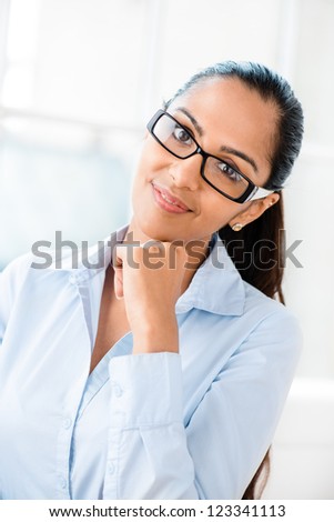 Beautiful young Indian business woman portrait happy smiling