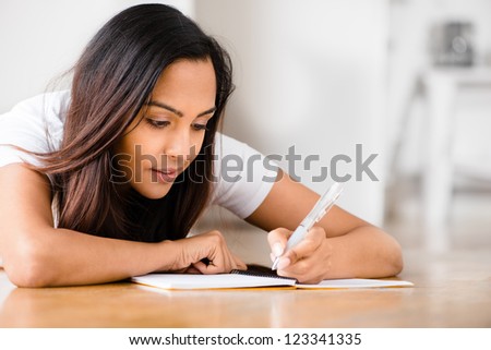 Indian woman student education writing studying