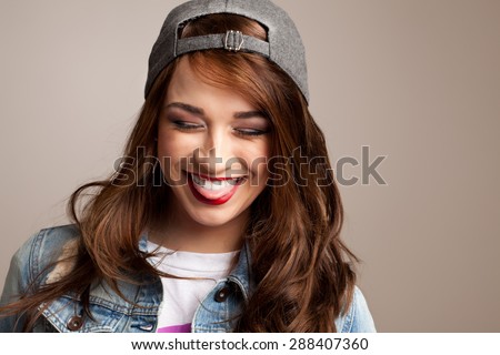 Embarrassed Teenager laughing at herself