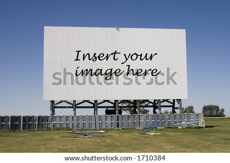A drive-in movie screen with words.
