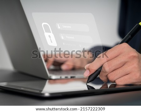 A safe account is held by a lady who has a tablet and a laptop computer. Hacking a Phishing mobile phone using a password to get access to a smartphone, concerns with internet security Foto d'archivio © 