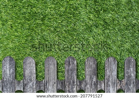Gray wood plank texture on artificial grass