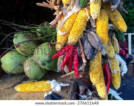 Group of fruits and vegetable been hang and left to dry and rotten