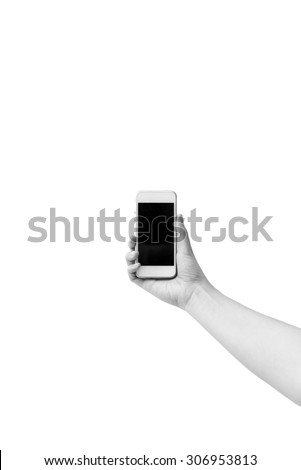 Cell phone in a woman\'s hand isolated in black and white