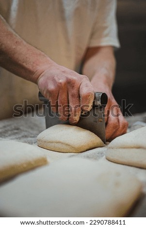 Similar – Foto Bild Bäcker formt Brot in der Küche