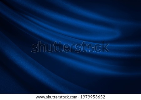  Black blue abstract background. Dark blue silk satin texture background. Shiny fabric with wavy soft pleats. Dark blue elegant background with copy space for your design. Liquid wave effect.          ストックフォト © 