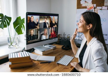 Work from home. Business video conferencing. Woman having video call via computer in the home office. Business team. Virtual house party. Online team meeting video conference calling from home