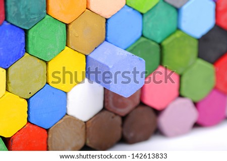 The stacks of crayon shot over white background