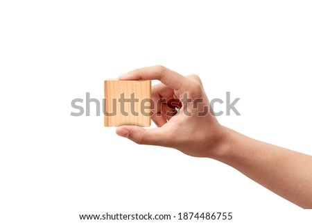 Similar – Image, Stock Photo Hand holds a small red gift for birthday or Christmas.