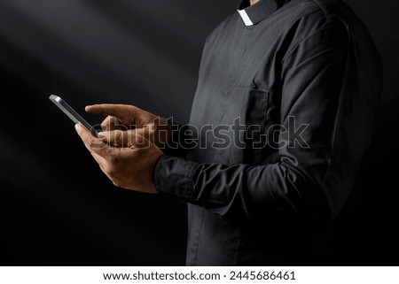 Image, Stock Photo Pastor at the altar table with the book of baptism