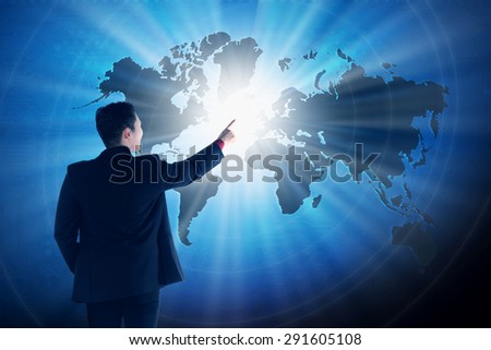 Asian business man touching world on virtual screen. Globalization business concept