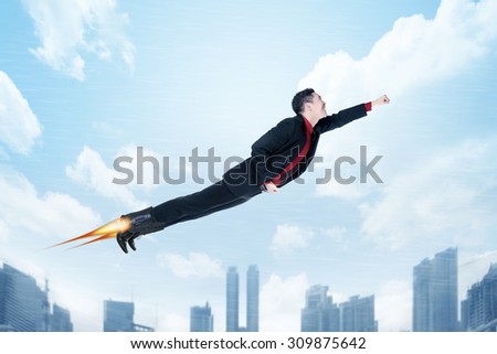 Business man flying with rocket on his shoes.Job promotion concept