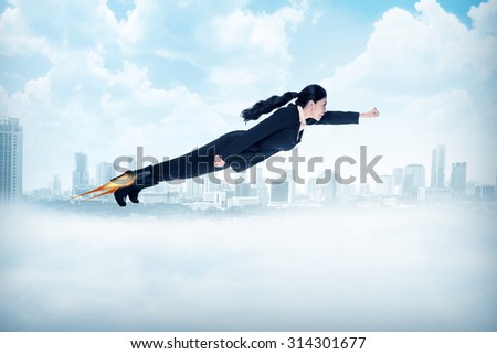 Business woman flying with rocket on her shoes. Business career concept