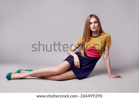 https://image.shutterstock.com/display_pic_with_logo/2391122/266499290/stock-photo-beautiful-young-sexy-woman-with-long-blonde-hair-with-natural-make-up-wearing-short-evening-dress-266499290.jpg
