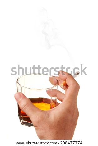 hand with a cigarette and hold a glass of whiskey