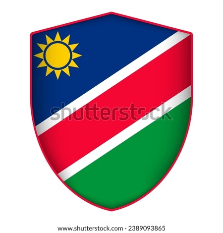 Namibia flag in shield shape. Vector illustration.