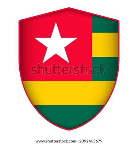 Togo flag in shield shape. Vector illustration.