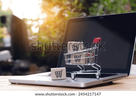 Similar – Image, Stock Photo Shopping online with a notebook on a pink background