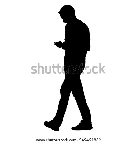 Young man going forward and holding a cell phone and writing sms, vector silhouette