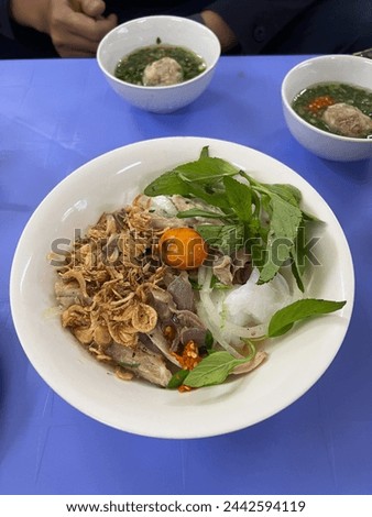 Similar – Image, Stock Photo Banh Uot Long Ga, unique vietnamese dry rice noodles (flat and wide like wet rice cake noodle) dish mixed with herbs and meat, a local delicacy of Da lat Vietnam
