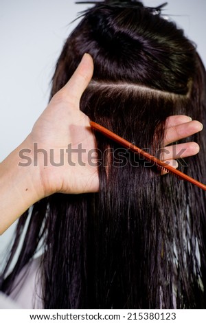 The process of hair coloring,hair coloring,Hair Colouring in process,Woman gets new hair colour,Hair Colouring in process