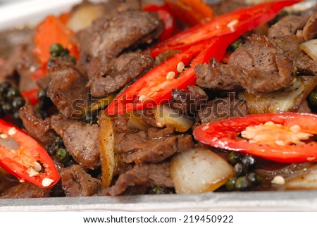 chinese black bean beef stir fry,Pan of the chicken, pepper, mushroom, onion and tomato,Sizzling beef with black pepper