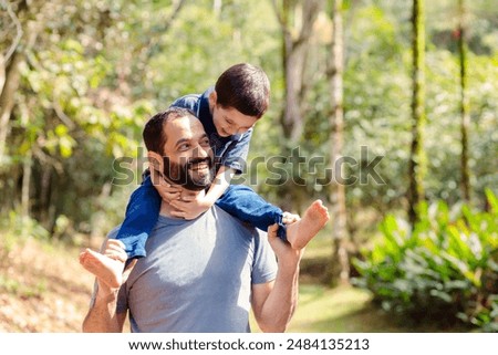 Image, Stock Photo Father with his young child in the home kitchen