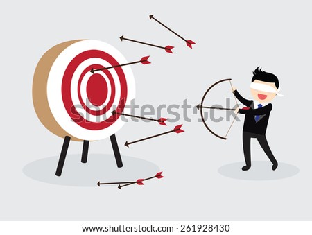 Blindfold businessman try to hit a target
