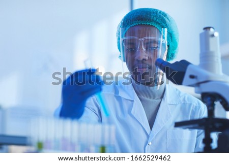 Similar – Image, Stock Photo caucasian doctor wearing protective mask and gloves indoors. Using an alcohol gel or antibacterial disinfectant. Hygiene and corona virus concept