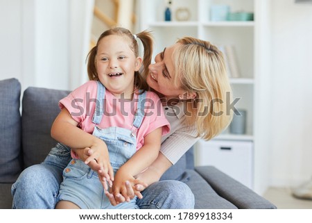 Similar – Image, Stock Photo Young mother embraced a newborn baby boy and kissing him