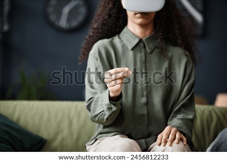 Similar – Image, Stock Photo Unrecognizable woman in VR goggles controlling drone