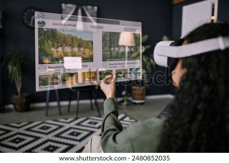 Similar – Image, Stock Photo Unrecognizable woman in VR goggles controlling drone