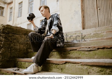 Image, Stock Photo Man shooting building facade with smartphone in downtown