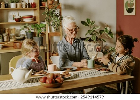 Similar – Image, Stock Photo Senior woman spending quality time with her daughter