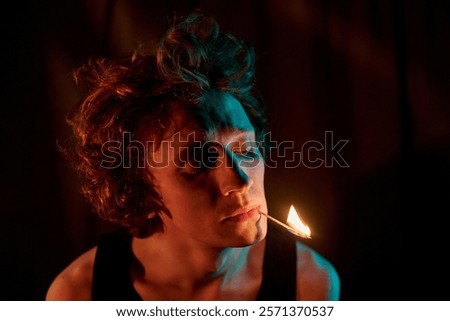 Similar – Image, Stock Photo Adult man smoking while looking at camera during sunset