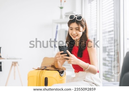 Similar – Image, Stock Photo Young woman traveler checking writing on smart phone during sunset day at Iceland, close up image.