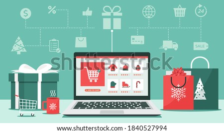 Christmas online shopping concept on laptop screen with gift boxes, shopping bags, the shopping cart on the desk, and icon, winter holidays sales, flat vector illustration