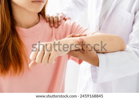 Similar – Image, Stock Photo rehabilitation therapy. Hands treating a young woman’s shoulder