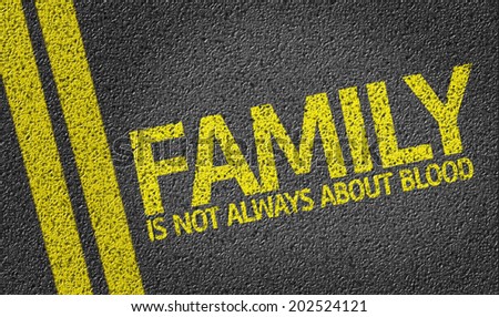 Family Is Not Always About Blood written on the road