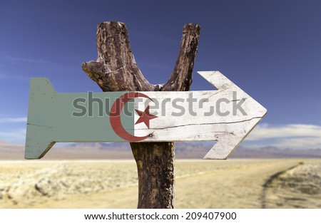 Algeria wooden sign with a desert background